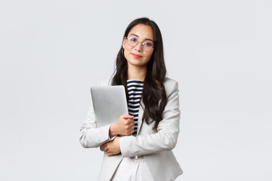 business finance employment female successful entrepreneurs concept young asian businesswoman bank clerk glasses holding laptop compress